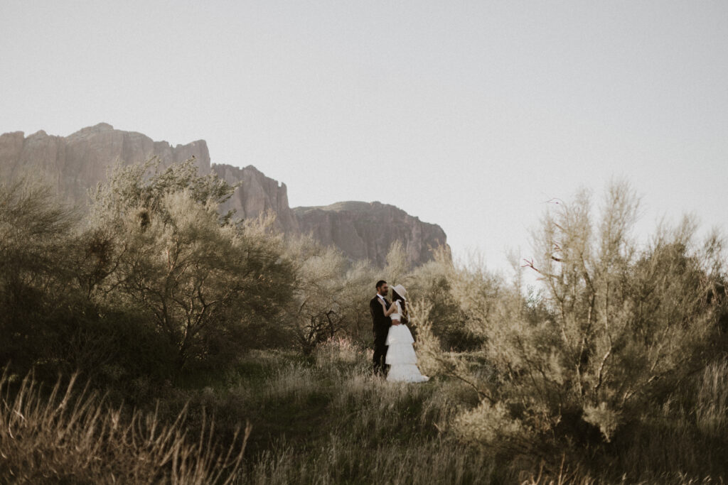 Bride and groom eloping in the Arizona Desert just outside of Lost Dutchman state park. 