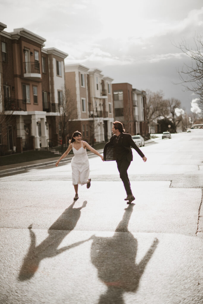 Couple photoshoot in the rain in the middle of a road