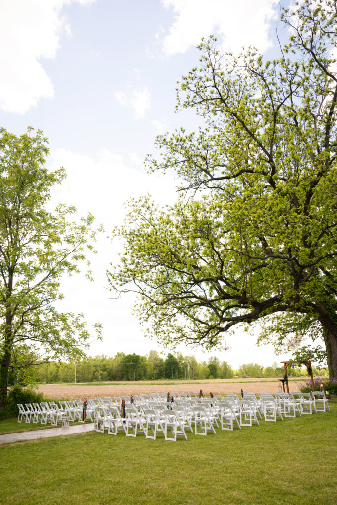 Outdoor ceremony space at The Vintage Rose Barn wedding venue in Michigan.