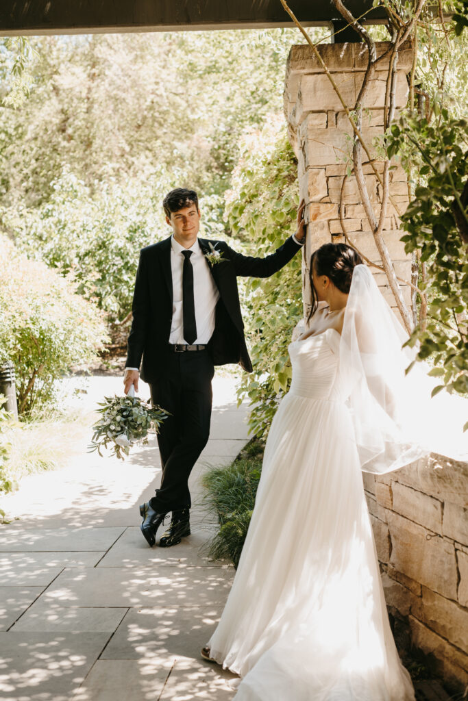 Bride and groom formal portraits taken in a garden