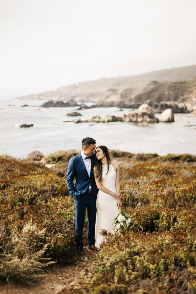 Bride and Groom portraits on the water in California.