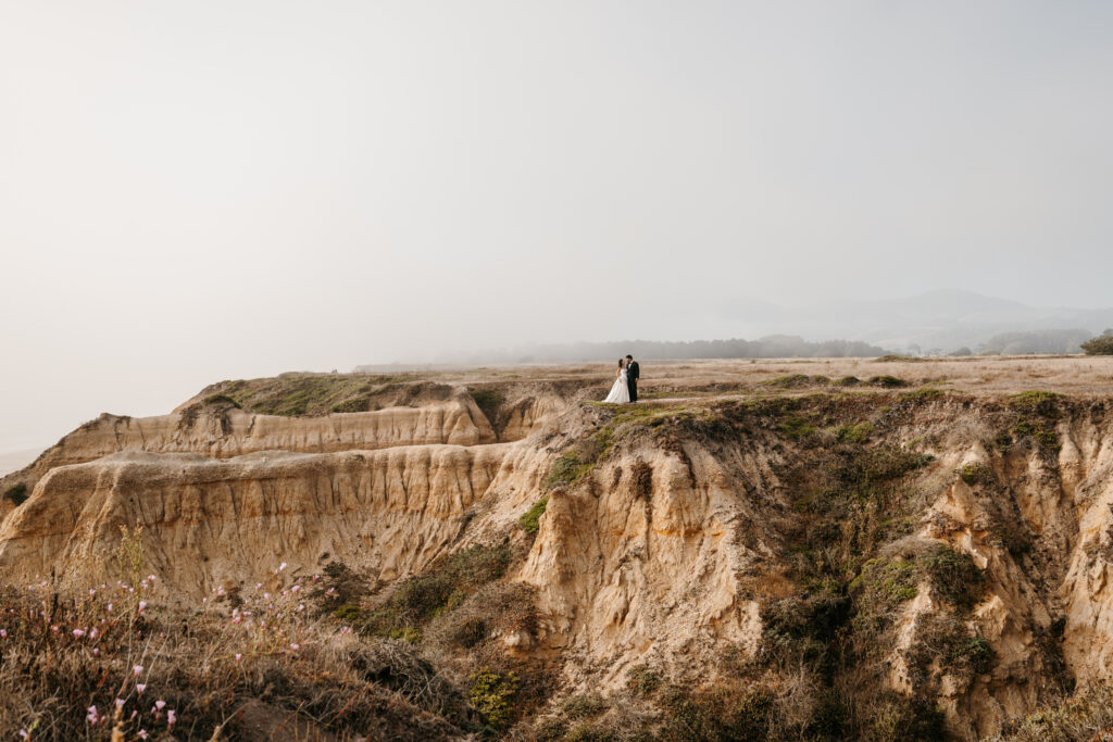 Eloping at Half Moon Bay on a cliff side