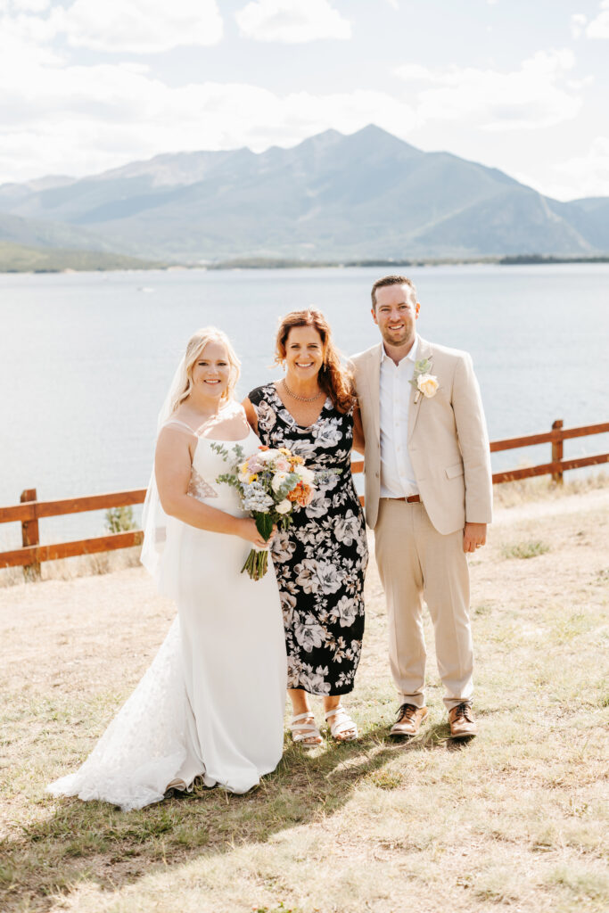 Bride and Groom photo with officiant