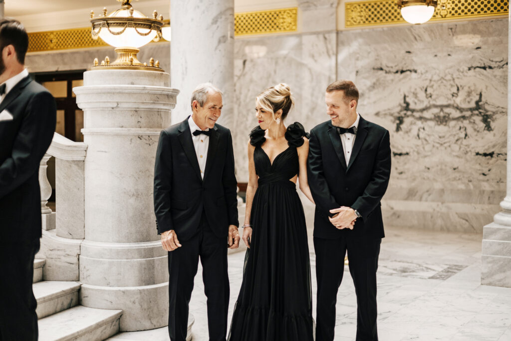 A Utah State Capitol building wedding day with guests