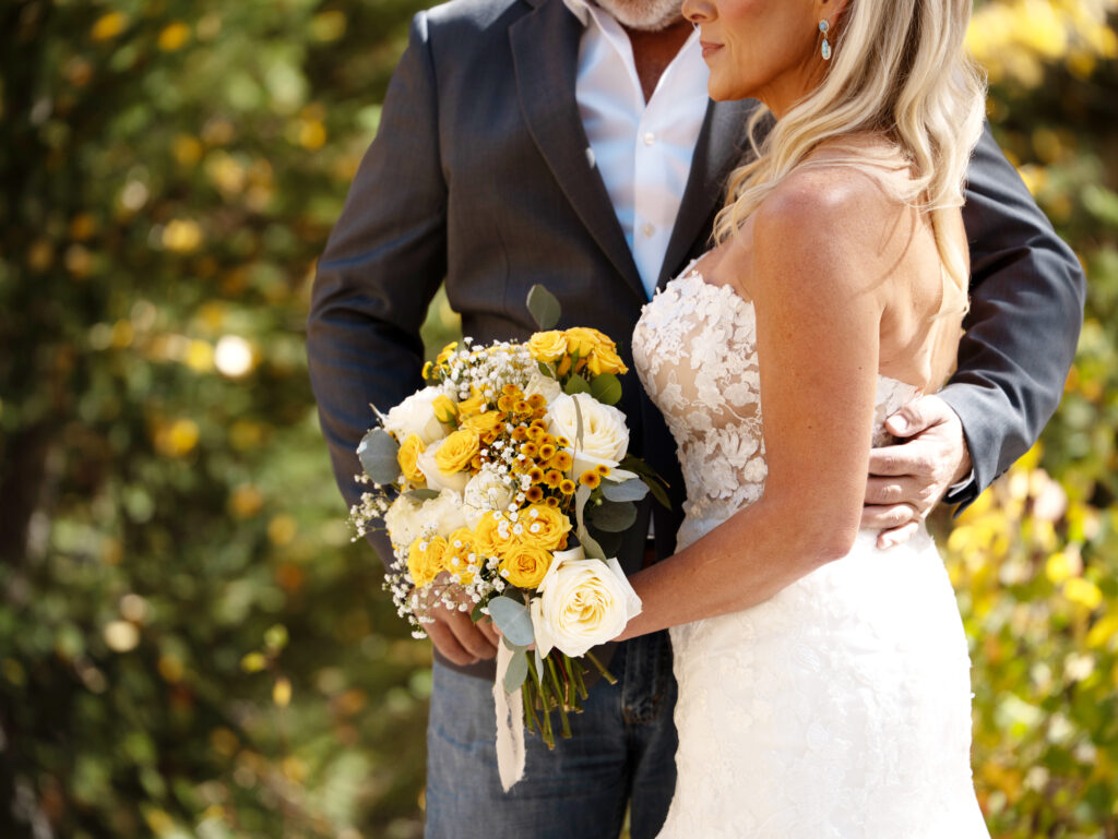 Yellow and white rose wedding bouquet.