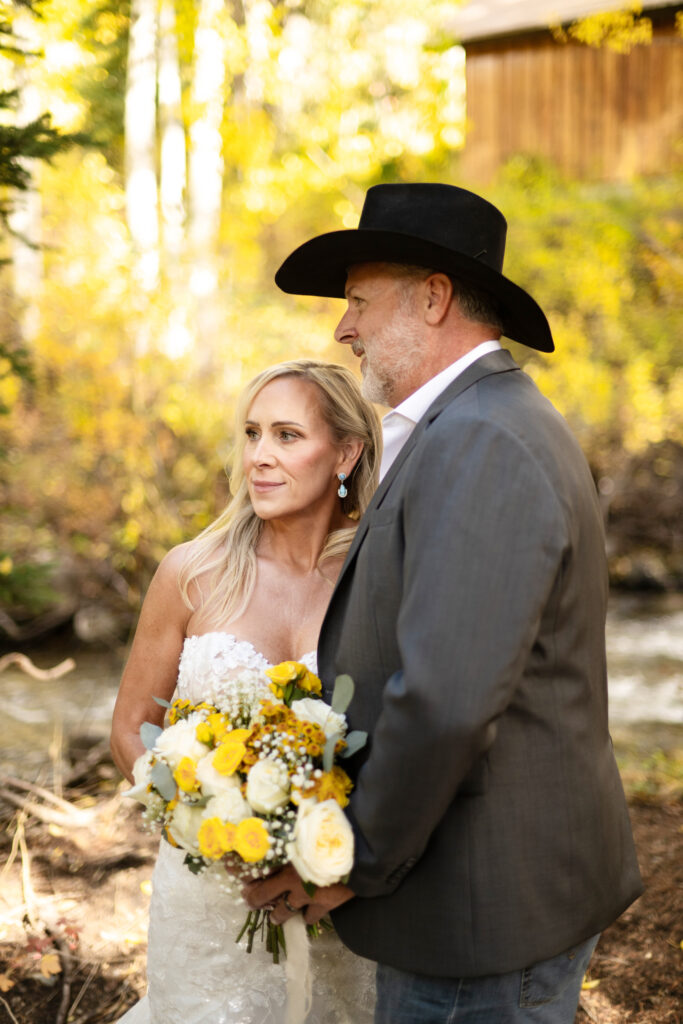 Bride and groom in cowboy hat