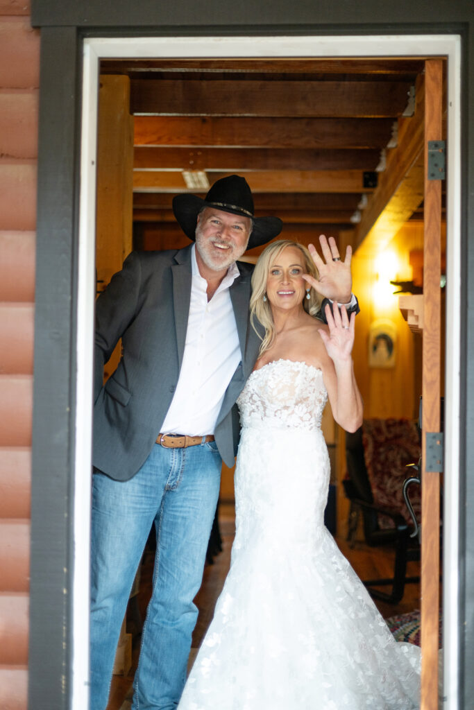 Bride and Groom in wedding attire in a cabin