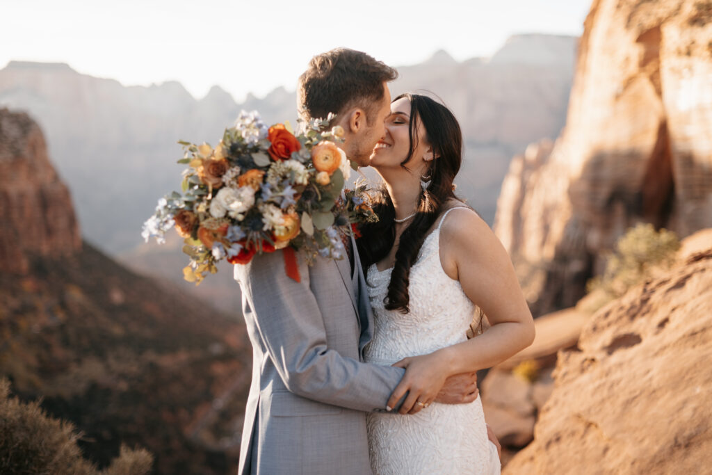 Bride and Groom at canyon overlook in Zion National Park