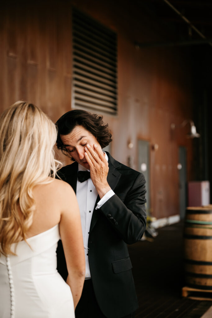 Bride and Groom reading private vows before the wedding ceremony