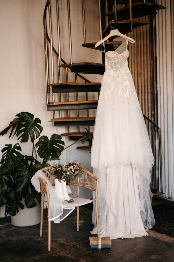 Bride getting ready to for her wedding at the white shanty wedding venue in Provo, Utah.