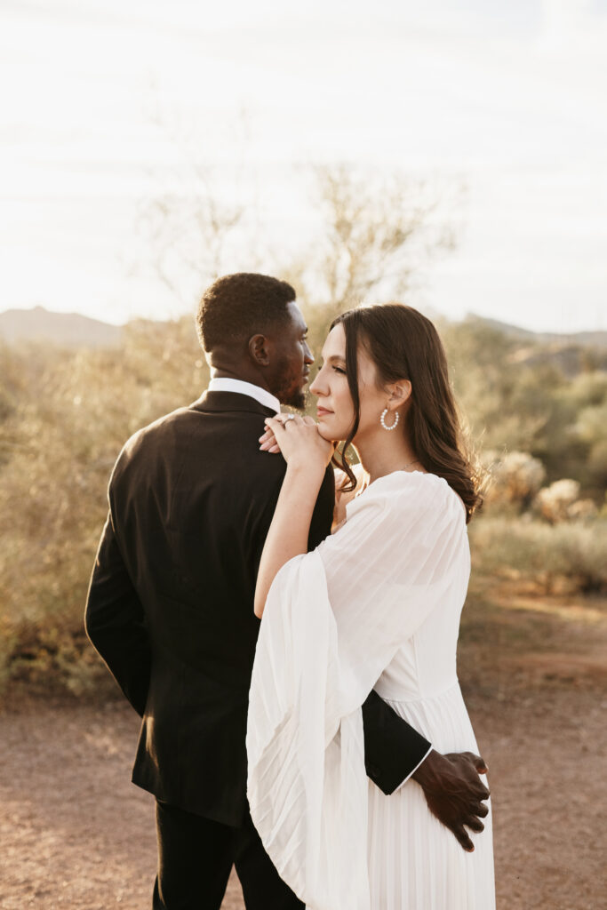 Best Places to Elope in Mesa Arizona with cactus and a view of the Superstition mountains.