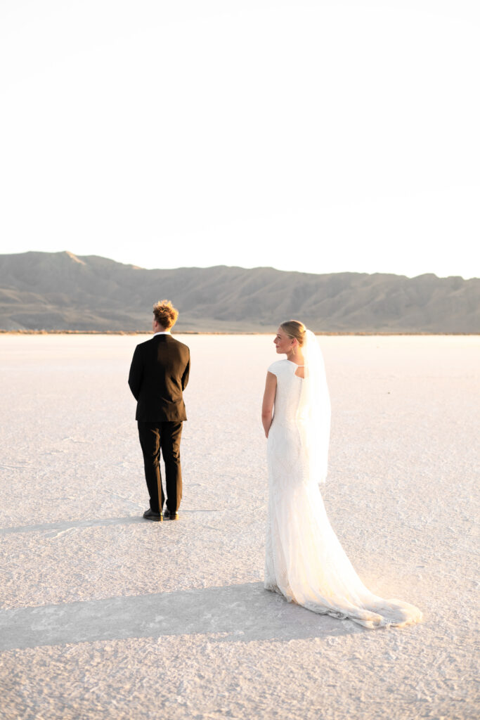 First look with bride and groom at the Bonneville Salt Flats in Utah