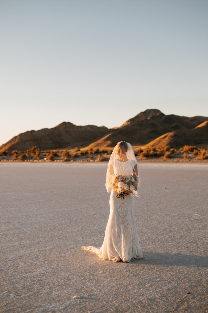 Luxury elopement styling at Bonneville Salt Flats with neutral tones and modern details
