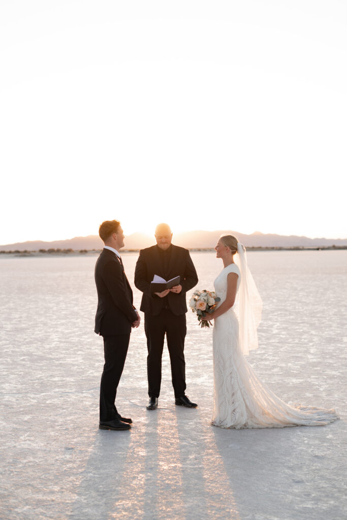 Wide shot of Bonneville Salt Flats elopement location with couple in distance