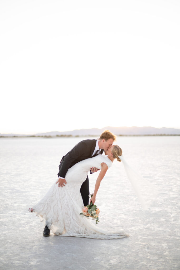 Bride and groom celebrating after ceremony at Bonneville Salt Flats elopement