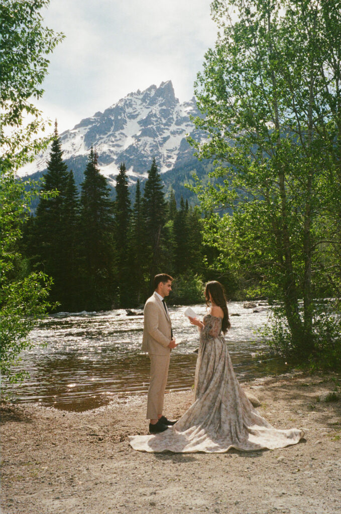 What to Pack for Your Grand Teton National Park Elopement. Bride and Groom eloping at Jenny Lake in Grand Teton National Park