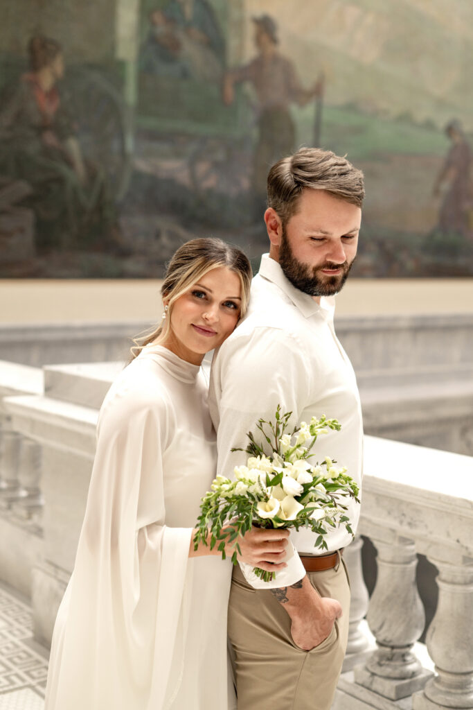Bride and Groom eloping at the Utah State Capitol Building indoors during the morning